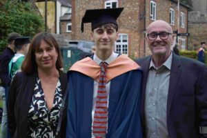 Harry Bentley (centre) with his mum and dad at the annual Eastern Education Group's graduation ceremony.