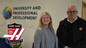 Andrew Ward, Director of Haas Automation UK and Laraine Moody, Group Principal University & Professional Development, celebrating the announcement of a grant from the Gene Haas Foundation to West Suffolk College.