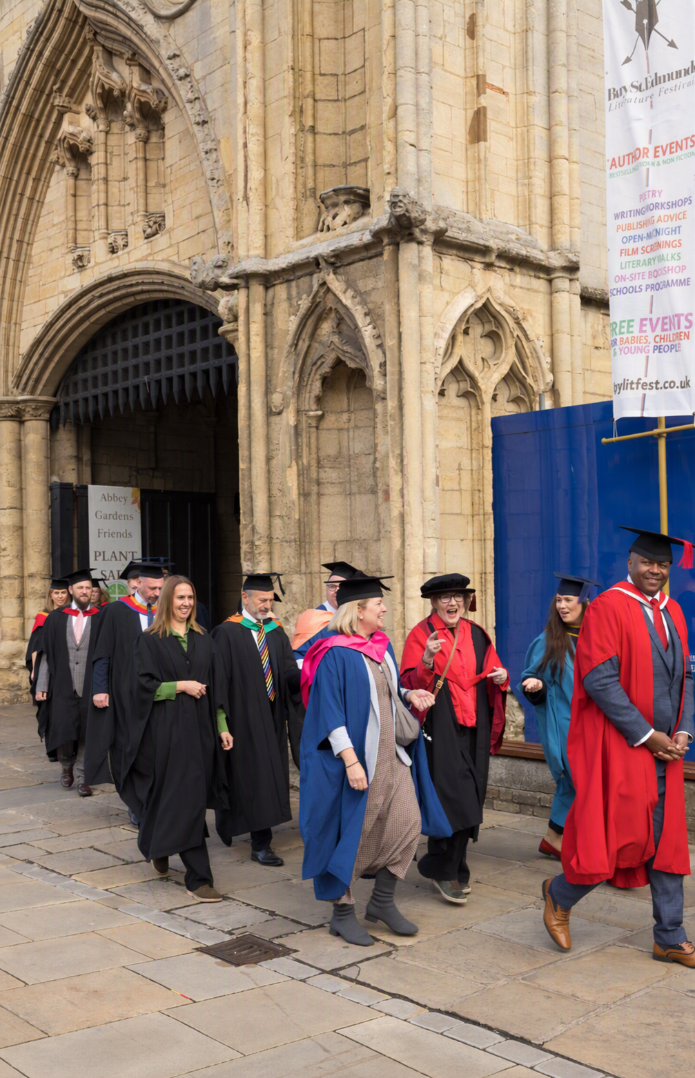 Members of the procession exiting the Abbey Gardens