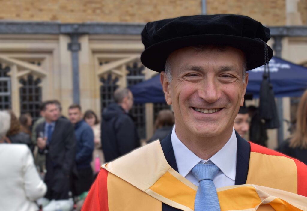 A proud Dr Nikos Savvas OBE DL at the annual University Studies at West Suffolk College graduation ceremony
